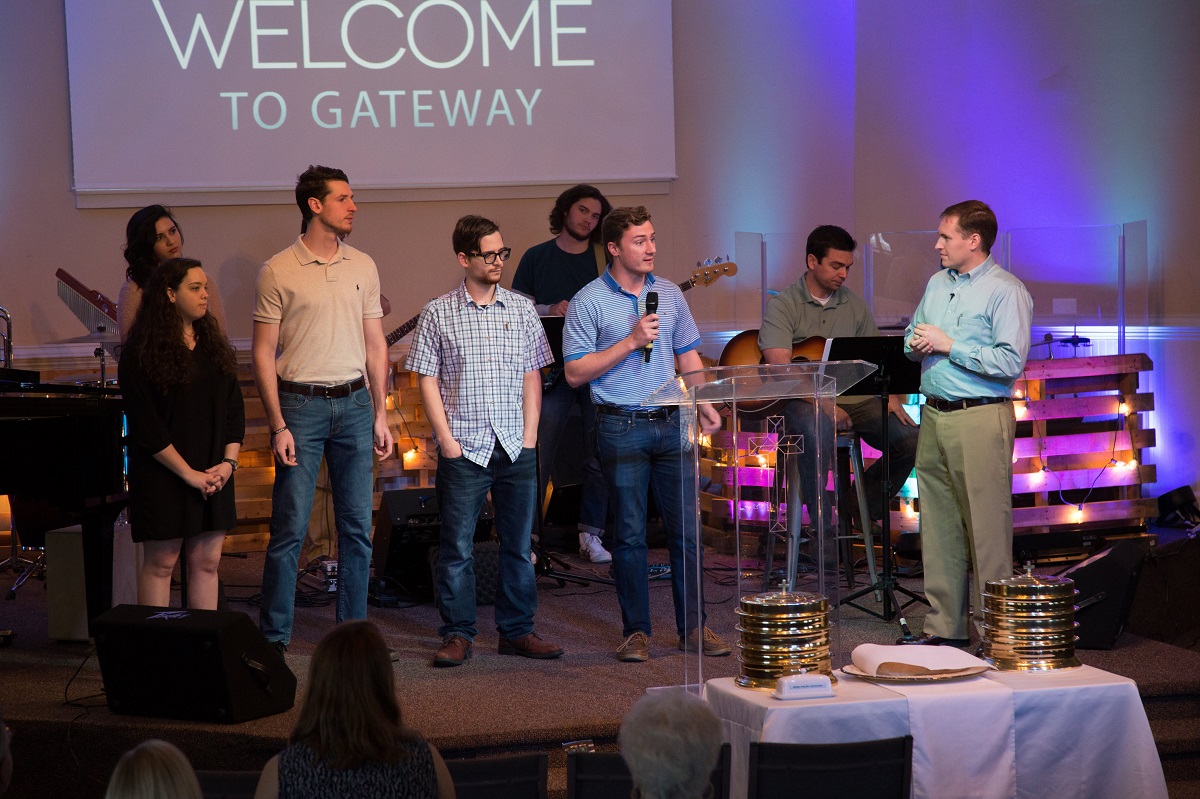 College students having an opportunity to share with the congregation about their mission trips